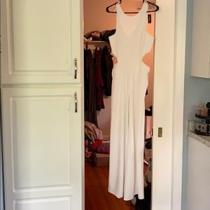 White jumpsuit with side cut outs